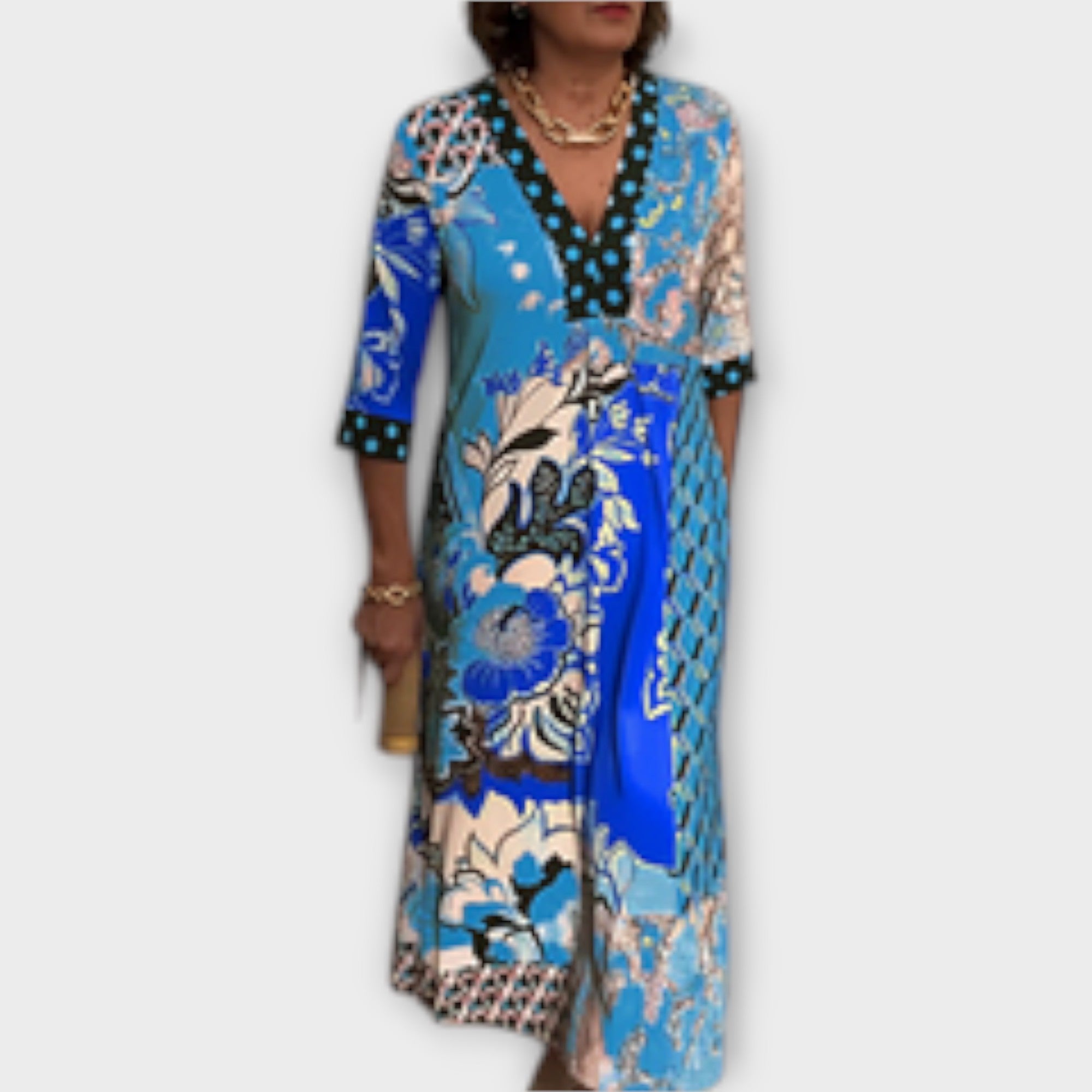 Haljina z elegantnim izrezom in edinstvenimi vzorci