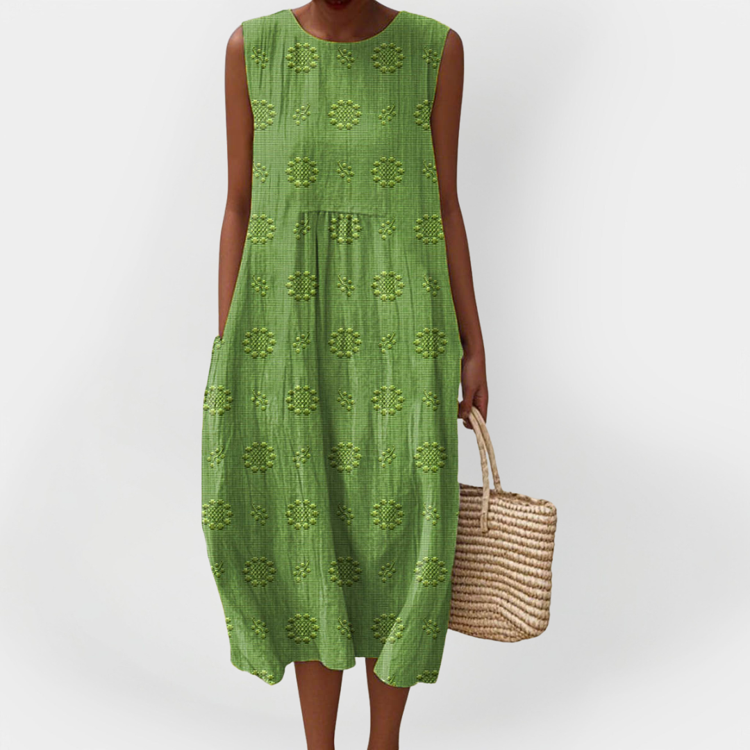 Elegantna brezrokavna bombaška obleka s prednjimi žepi