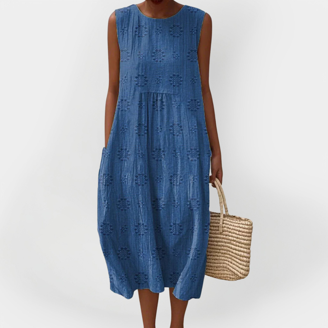 Elegantna brezrokavna bombaška obleka s prednjimi žepi