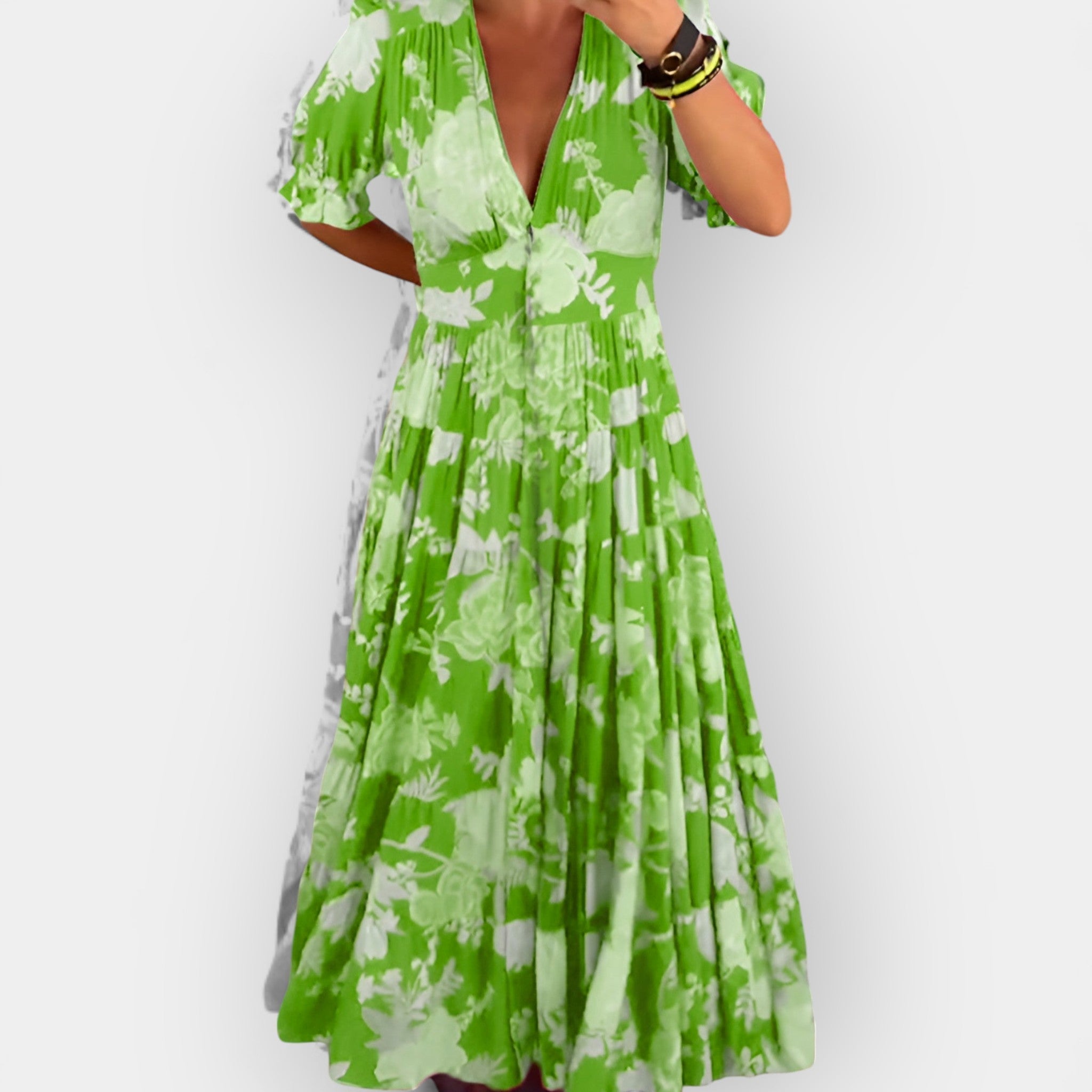 Lahka floralna obleka z žepi