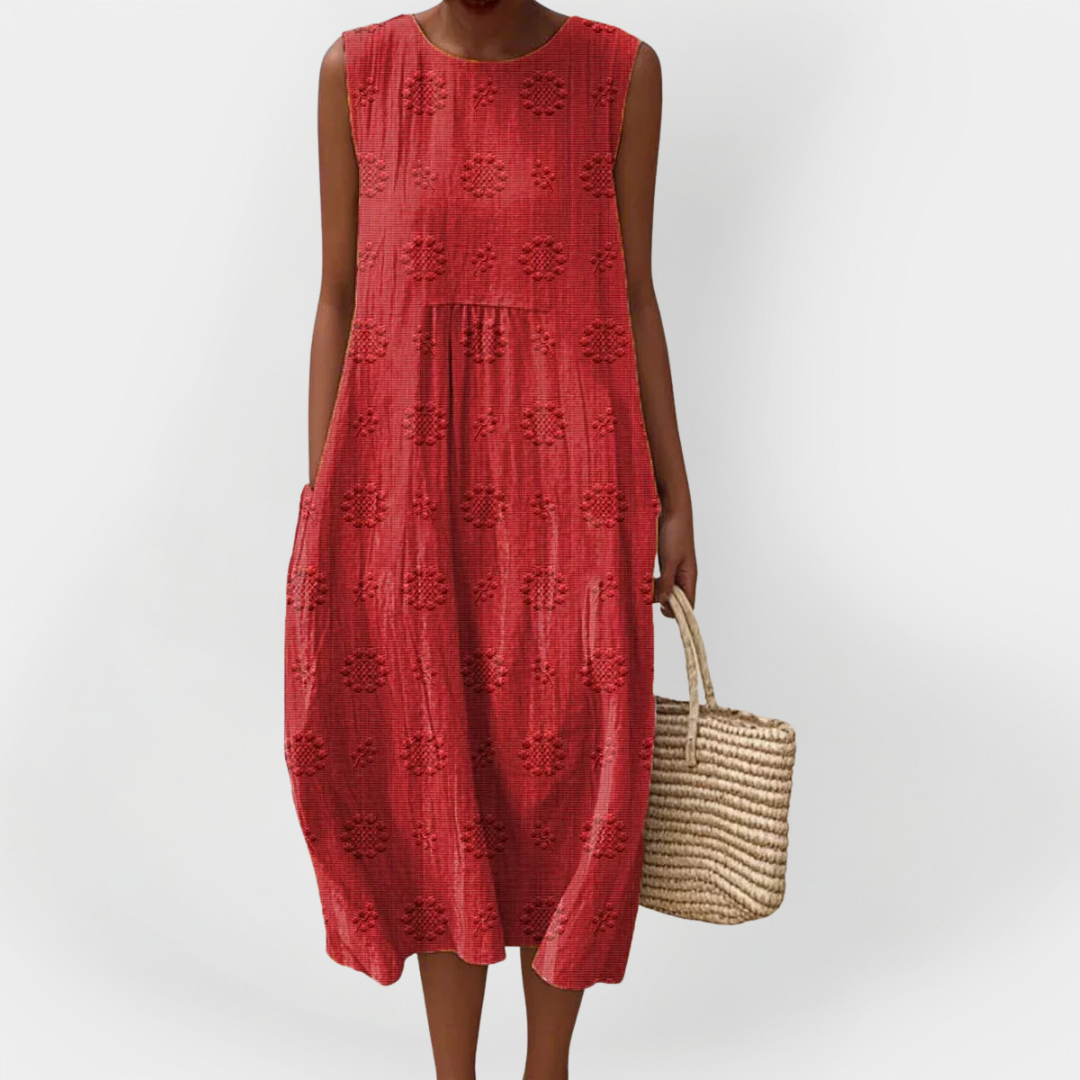 Elegantna brezrokavna bombaška obleka s prednjimi žepi