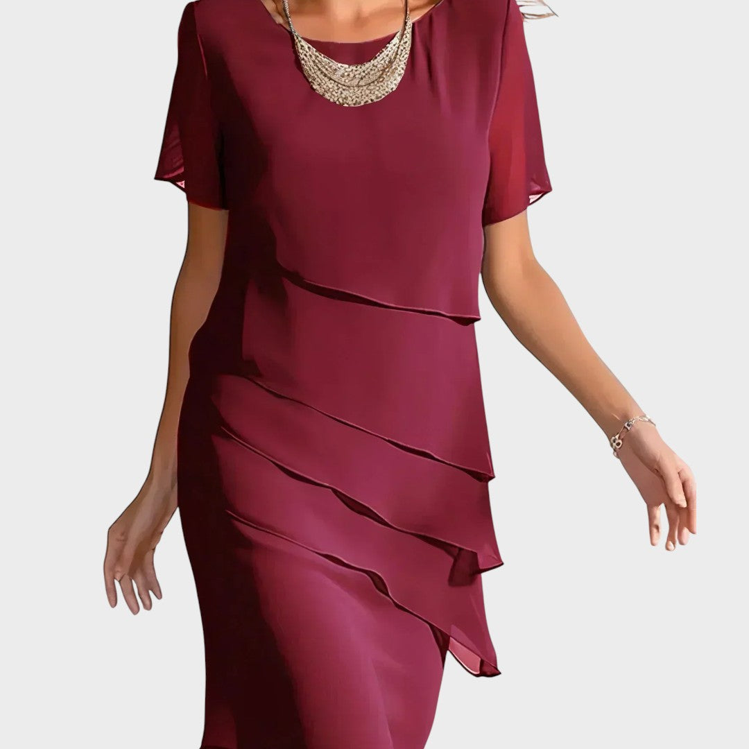 Kristina – Elegantna obleka za oblikovanje postave