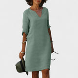 "Lana - Obleka z V-izrezom" could be rewritten as "Lana - V-Neck Dress".