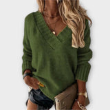 "Jane - Udoben Pulover z V-izrezom" can be rewritten as "Jane - Comfort V-Neck Sweater".
