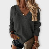 "Jane - Udoben Pulover z V-izrezom" can be rewritten as "Jane - Comfort V-Neck Sweater".