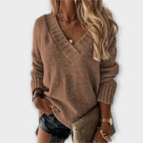 "Jane - Udoben Pulover z V-izrezom" can be rewritten as "Jane - Comfort V-Neck Sweater".