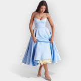 Elegantna midi obleka s stilsko linijo