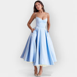 Elegantna midi obleka s stilsko linijo