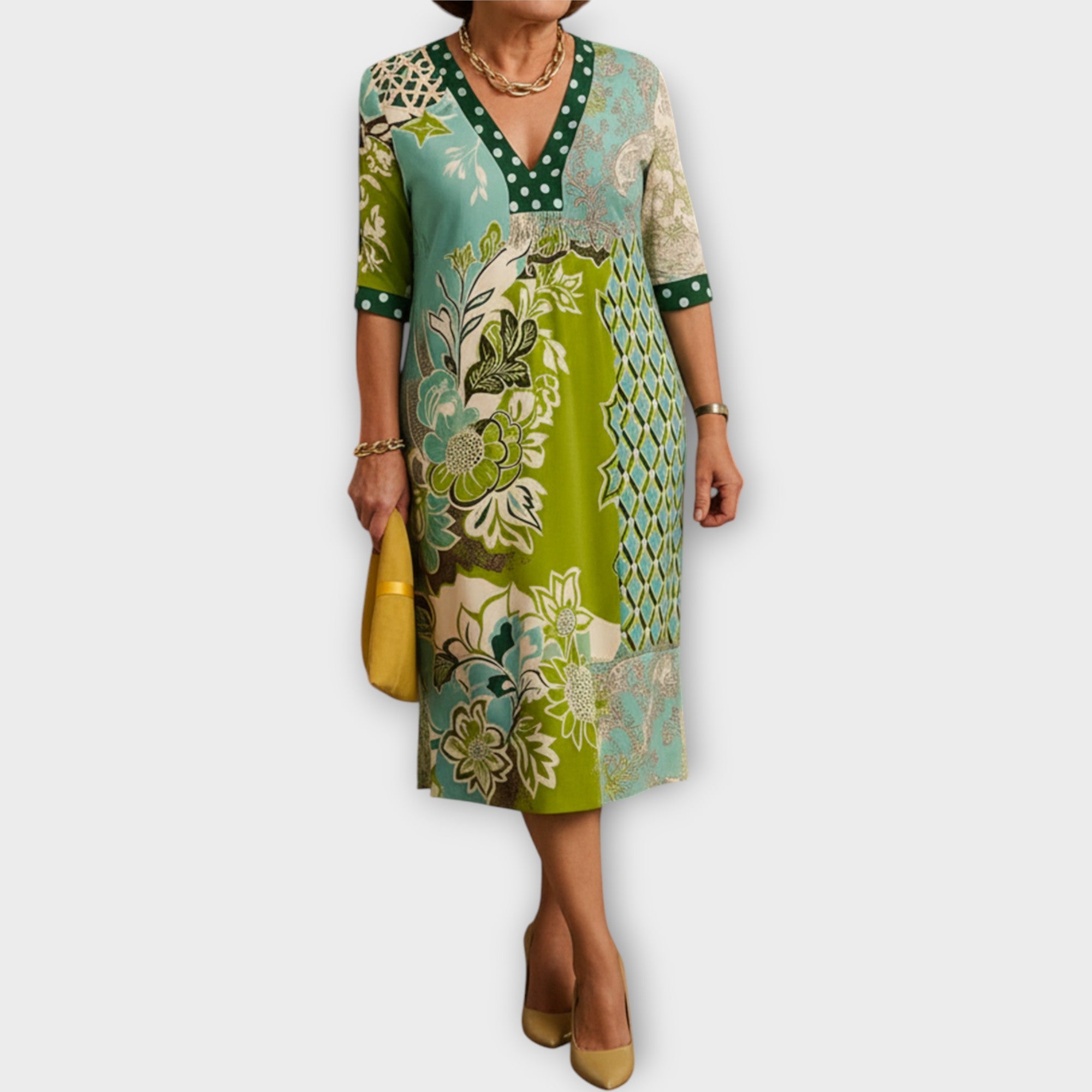 Haljina z elegantnim izrezom in edinstvenimi vzorci