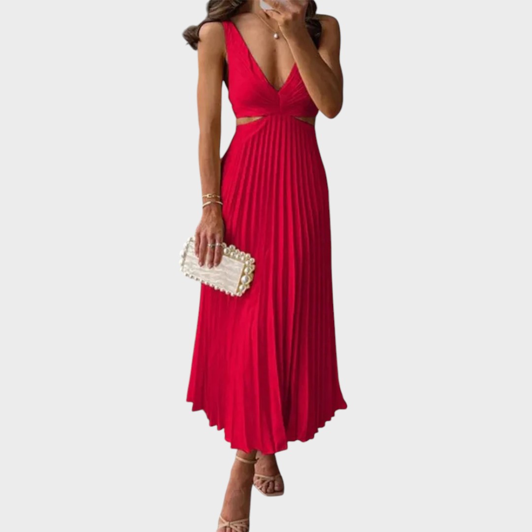 Katarina - Elegantna Obleka z V-Izrezom in Plisiranim Krilom" lahko prepišemo takole:

 "Katarina - Elegantna Obleka z V-Izrezom in Plisiranim Dnom