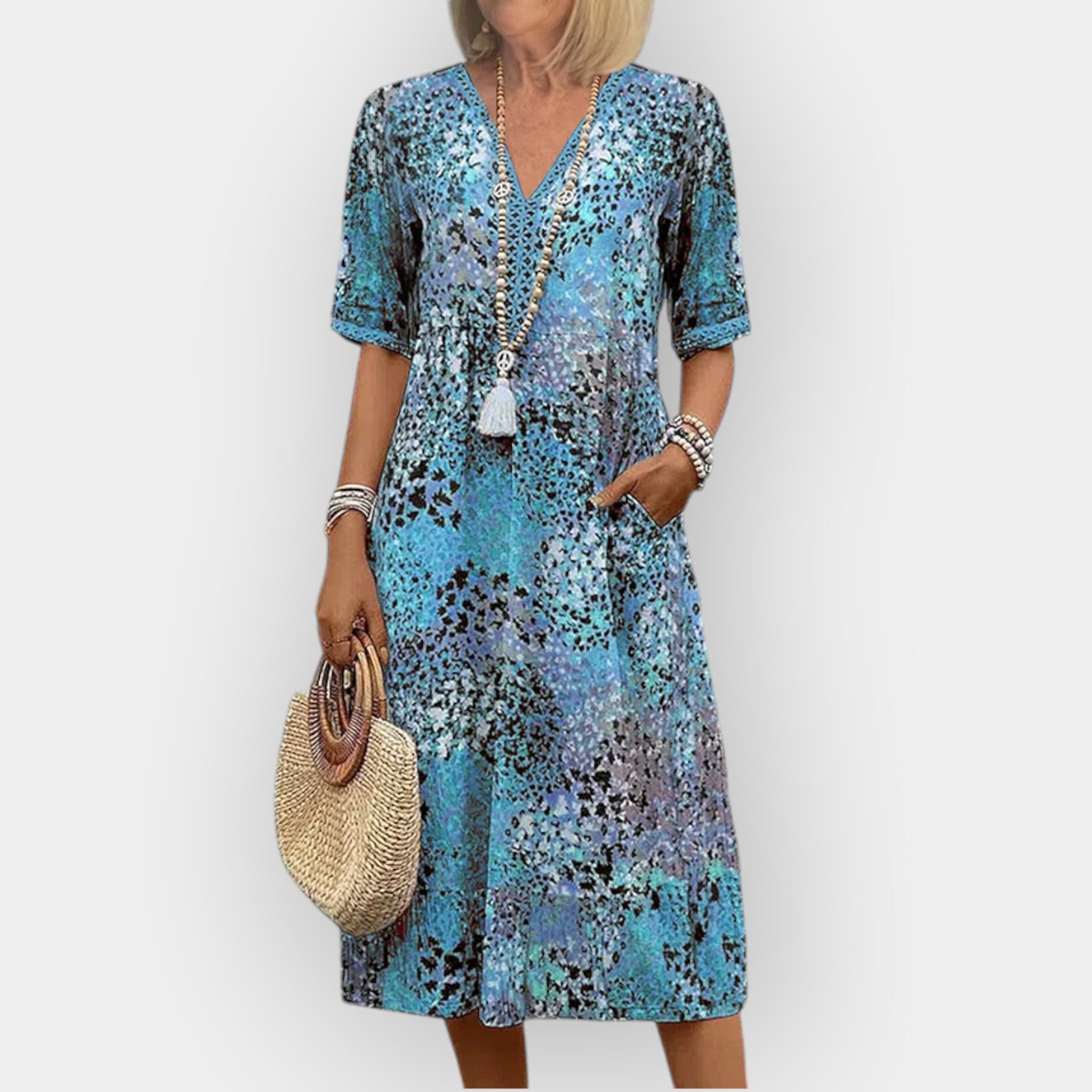 Floralna midi obleka s stilom