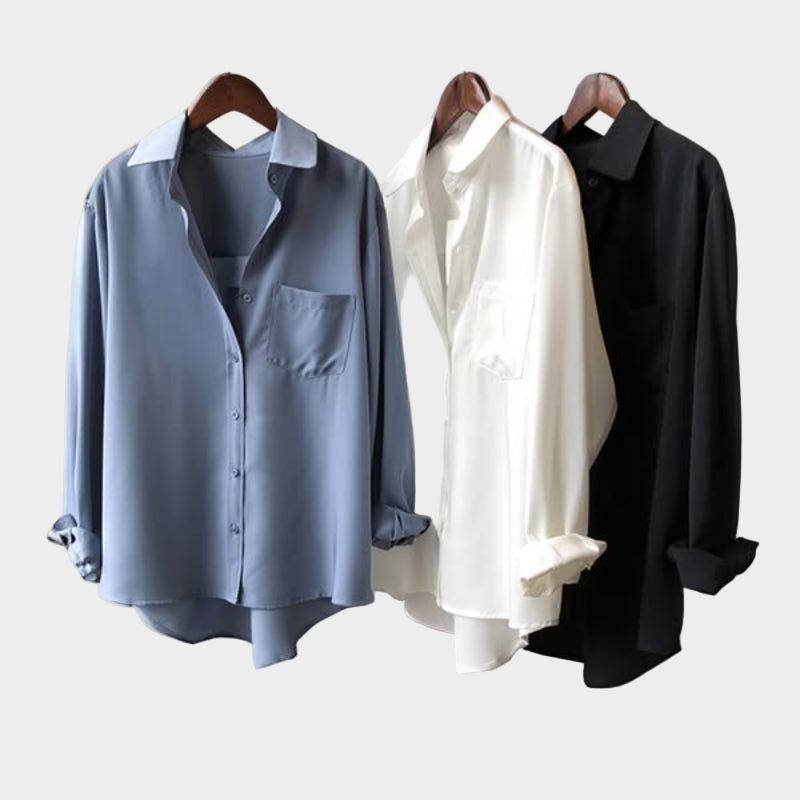 Bluzo-kosulja z elegantnim krojem in modernimi detajli.