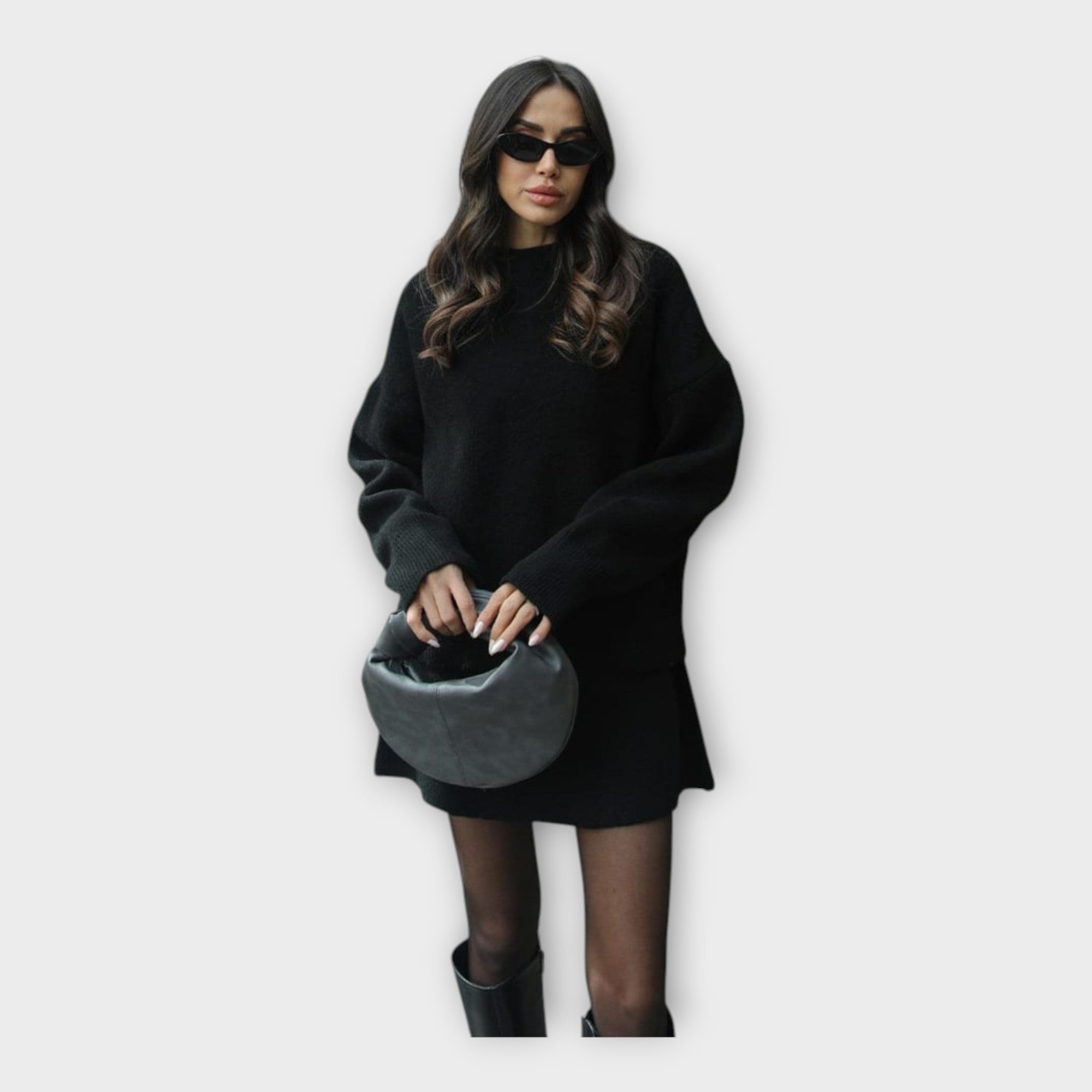 Komplet pletene bluze in krila s sodobnim dizajnom