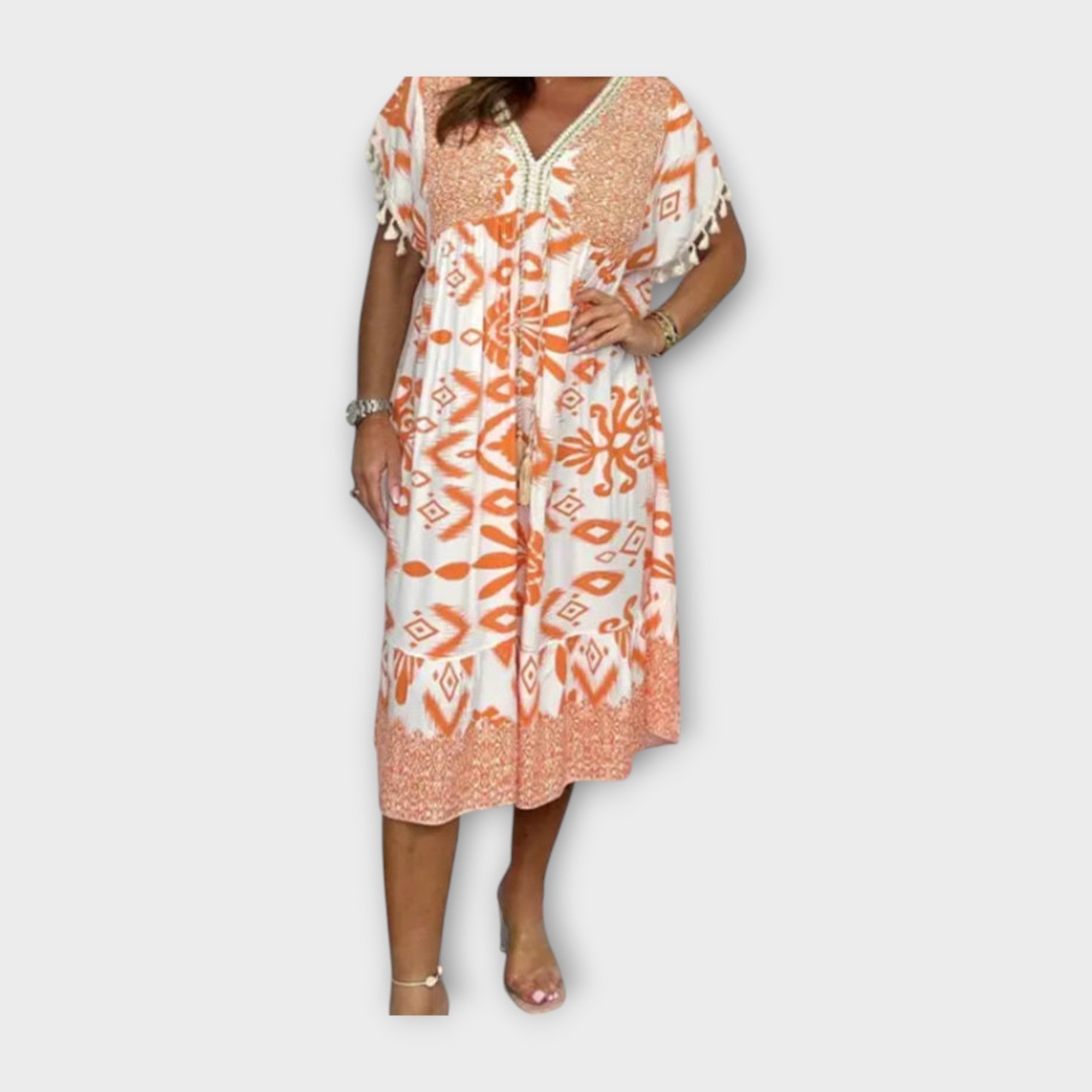 Kaftan dolžine pod koleni s vzorci in vezalkami