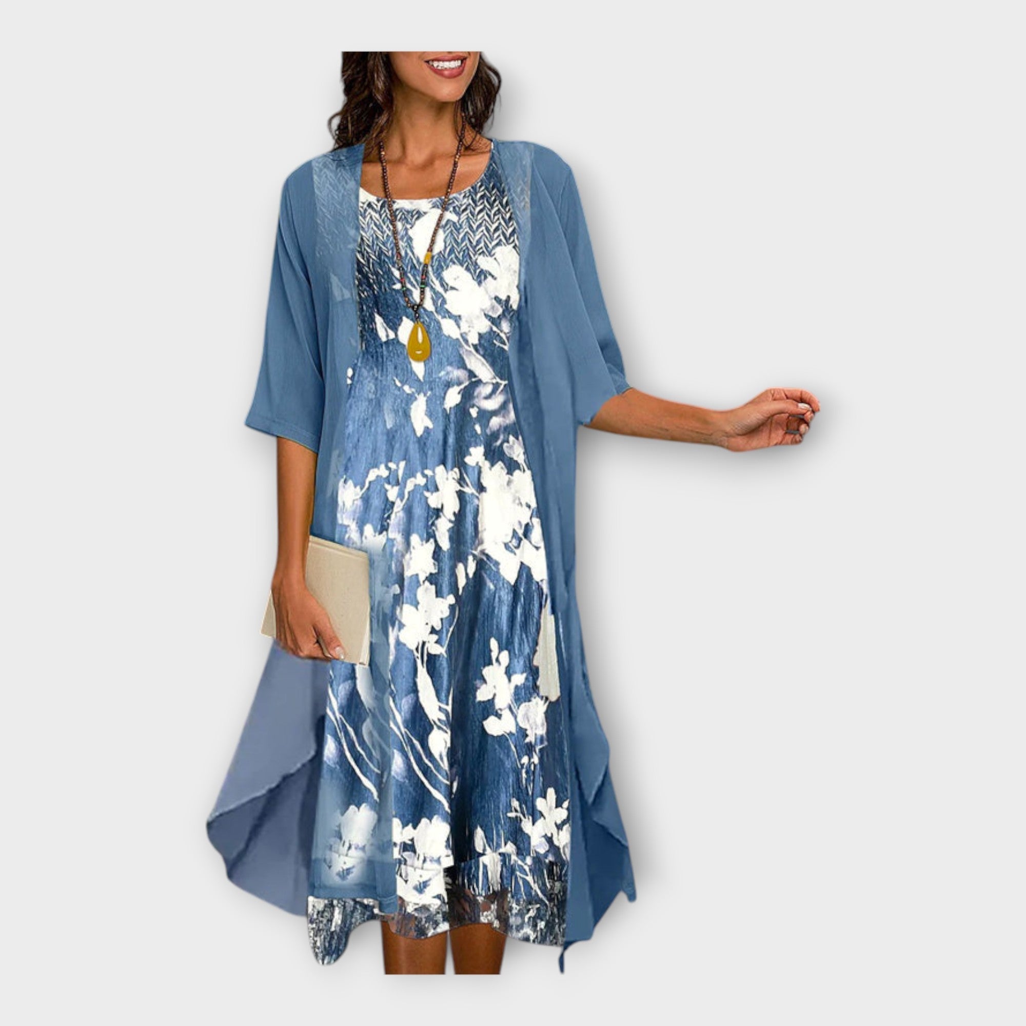 Lahka obleka z zunanjo jakno in vzorci