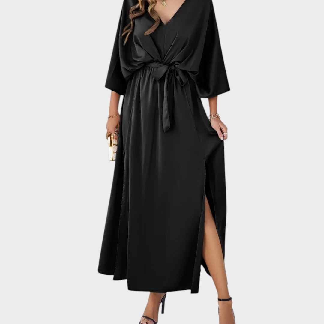 Cvita - Obleka z V-izrezom" lahko prepišemo kot "Cvita - obleka z V-izrezom.